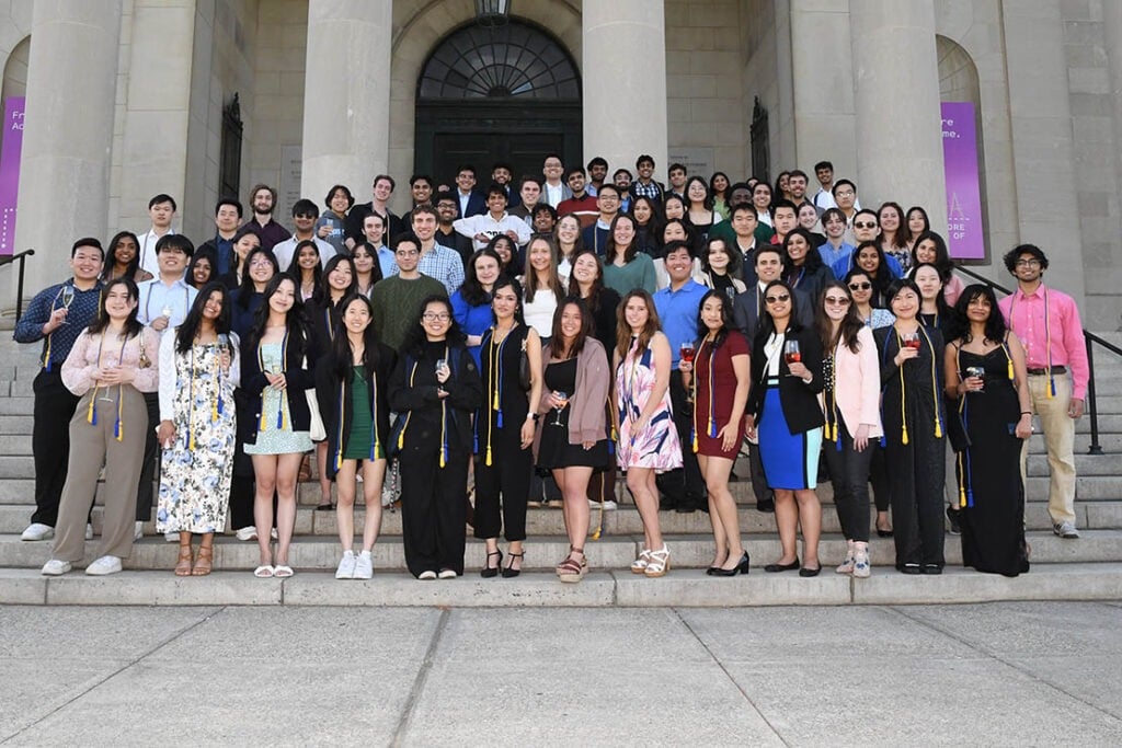 The graduating class gathers for a group photo.